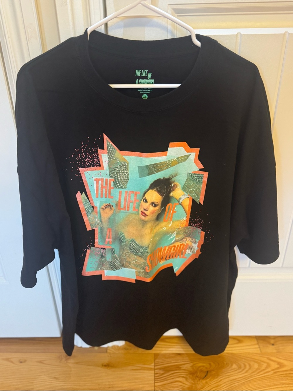 Taylor Swift Black Graphic Tee with Teal and Coral Accents